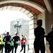 Participants jog under the Engineering Archway during the run in honor of the Boston Marathon on Saturday, April 20. AnnArbor.com I Daniel Brenner